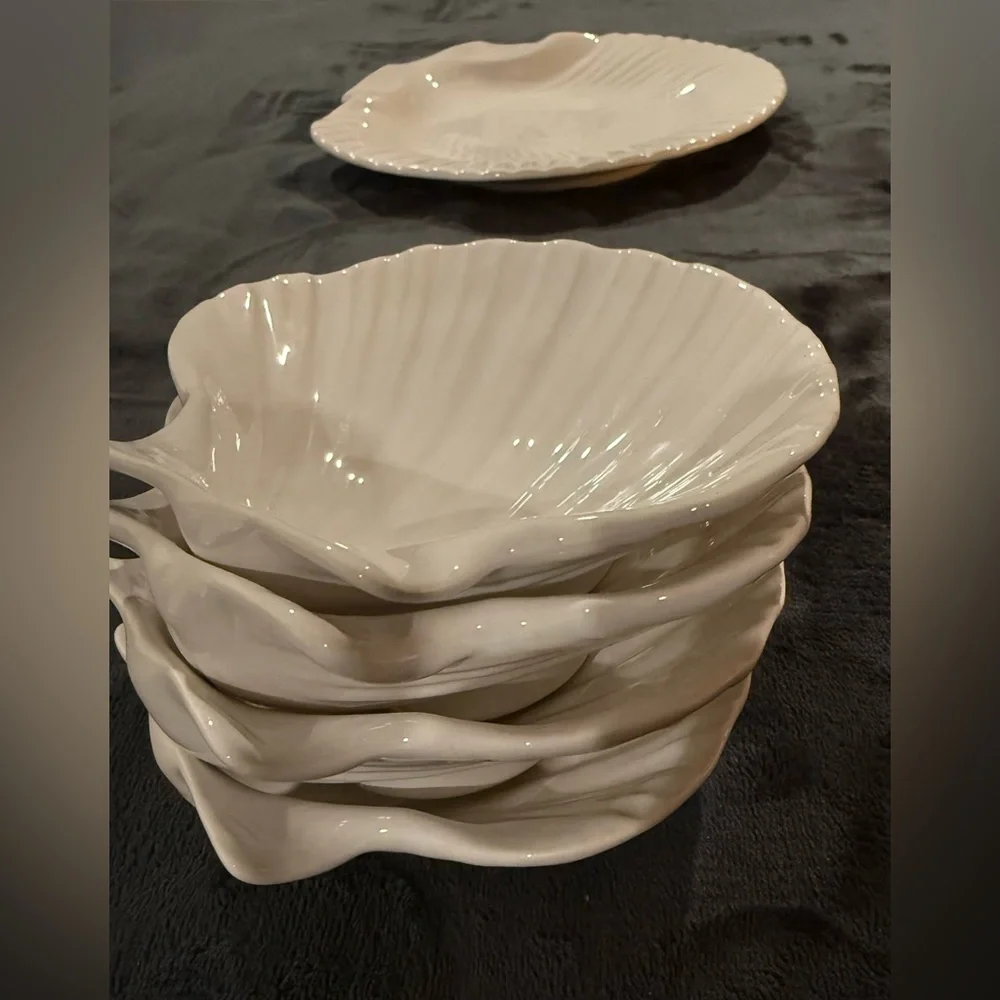 4 Sur La Table white, shell bowls. 5.5”
